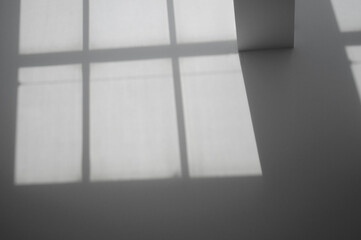 minimal modern window shadows wall and ceiling