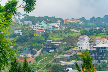 The city of Dalat.

A high-altitude city in Vietnam, founded by the French, in colonial times.