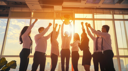 Fototapeta premium A team enthusiastically raises their fists in triumph as the sunlight pours in, celebrating success together in an urban office setting.