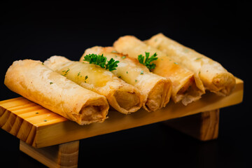 Spring rolls with black background