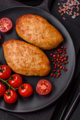 Delicious fresh fried minced fish cutlets with spices and herbs