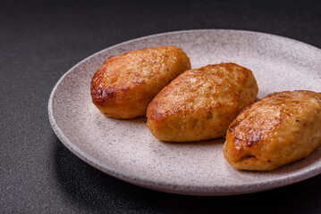 Delicious fresh fried minced fish cutlets with spices and herbs