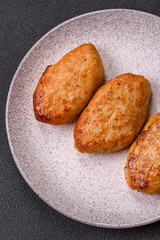 Delicious fresh fried minced fish cutlets with spices and herbs