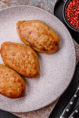 Delicious fresh fried minced fish cutlets with spices and herbs