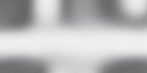 Abstract gray background with a gradient and a textured surface