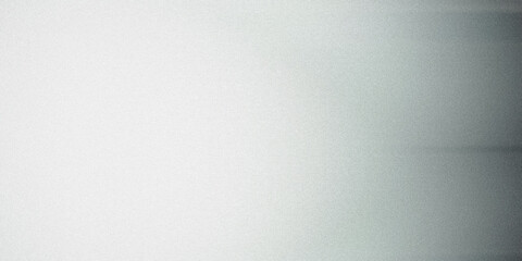 Obraz premium Light grey background with grainy textured surface fading to black on the right side