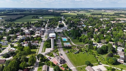 Fototapeta premium Aerial of Palmerston water tower in the Town of Minto, with residential areas and green surroundings