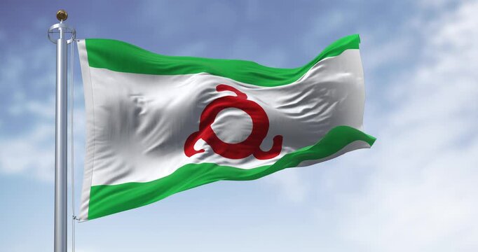 Ingushetia flag waving in the wind on a clear day.