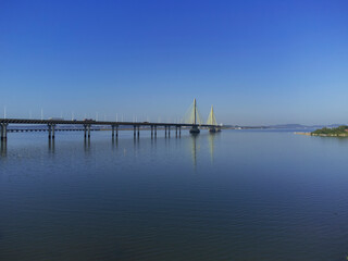 Fototapeta premium Anita Garibaldi Bridge in Laguna Santa Catarina Brazil. Bridge over the Imarui lagoon, highway 101.