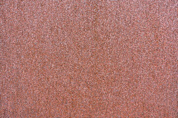 Fototapeta premium Detailed close-up of a rusty metal surface, displaying a rich, granular pattern. Ideal for backgrounds, design elements, and industrial-themed art concepts.