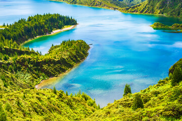 View of Lagoa do Fogo crater lake in green mountain landscape during summer from famous viepoint, Sao Miguel island, Azores, Portugal