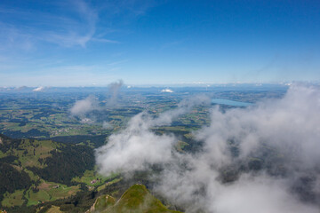 Mountain landscape partially in the clouds, view from Pilatus mountain peak, Lucerne