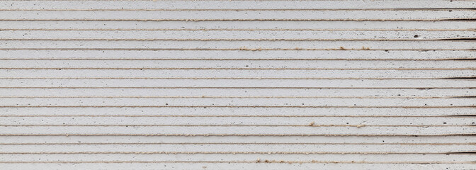 sheets of drywall as a background. side view