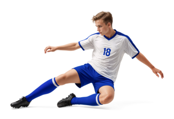 Professional soccer player doing sliding tackle on isolated background