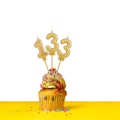 Birthday candle number 133 - Cupcake on white background