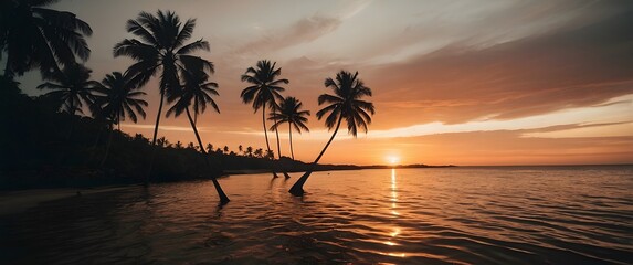 A nostalgic photograph of a tropical sunset, framed by the silhouette of palm leaves. The setting sun casts a warm, orange glow across the sky and the calm ocean water, 