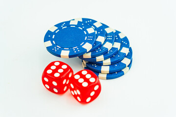 Gambling chips over white Poker chips and dice on white background