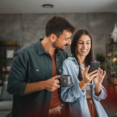 Portrait of girlfriend show mobile phone screen to her boyfriend