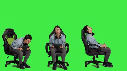 Obraz premium Displeased gamer feeling sad about losing video games championship, playing e sport tournament on tablet against greenscreen backdrop. Frustrated angry woman with gaming failure. Camera A.