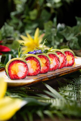 Elegant Sushi Rolls with Floral Garnish, Vibrant Sushi Platter with Edible Flowers, Artistic Presentation of Sushi and Flowers, Gourmet Sushi Dish with Decorative Touch