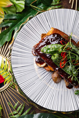 Glossy Ribs with Fresh Herbs, Tender Ribs in Savory Sauce, Juicy Barbecue Ribs with Garnish, Flavorful Glazed Ribs on Plate, Succulent Ribs with Green Leaves