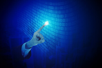 Closeup of a businessman finger touching the binary codes