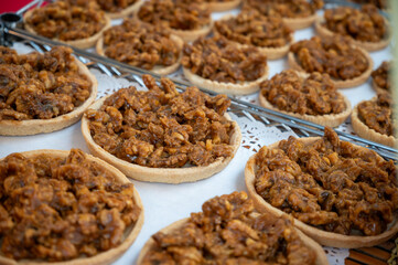 Walnuts tart cake form Perigord, Dordogne, fresh baked nuts cake on local farmers market in Saplat-du-Caneda, Perigord, France