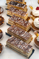 Portion of french mille-feuille cake, vanilla or custard slice, Napoleon puff pastry layered with pastry cream in bakery