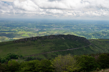 Fototapeta premium Travelling by old wooden train up to Larrun or La Rhune, Larhune mountain at the western end of the Pyrenees located on border of France and Spain, in traditional Basque provinces Labourd and Navarra