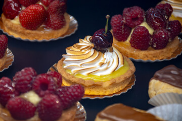 French cuisine, fresh baked iced raspberry cake with chantilly cream, sweet dessert