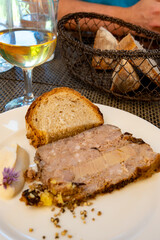Terrine foie gras fat liver specialty food product made of liver of a duck or goose fattened by force feeding, served in French restaurant in Perigoed, Dordogne, close up © barmalini