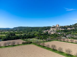 Beynac-et-Cazenac village located in Dordogne department in southwestern France with medieval Chateau de Beynac, one of most beautiful villages of France, aerial view