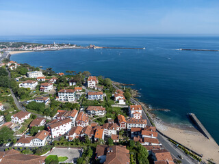 Fototapeta premium Aerial view on Ciboure and Saint Jean de Luz bay, port, sandy beach on Basque coast, beautiful architecture, nature and cuisine, South of France, Basque Country
