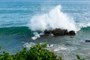 Strong sea waves breaking on a rock at the seaside. Live nature. Environment.
