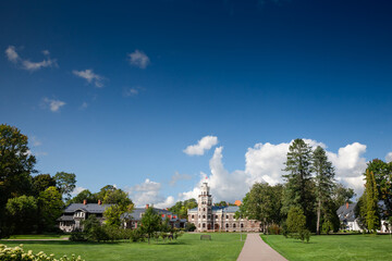 Main facade of the Sigulda new Castle with its tower and its garden. Built in 19th century by the kropotkin family it's neo gothic castle called Siguldas Jauna Pils in Sigulda, Latvia.