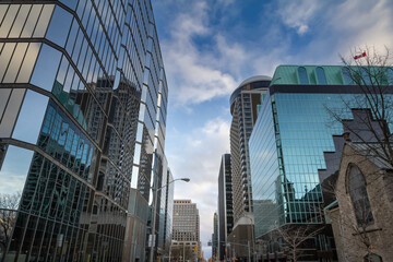 Fototapeta premium Panorama of a typical north american business district in a Street of Ottawa CBD with buildings of Ottawa skyline, towers & skyscrapers for Office space. Ottawa is a major hub for business in America