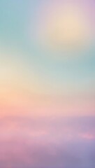Obraz premium A soft, out-of-focus background of a pastel sunset sky