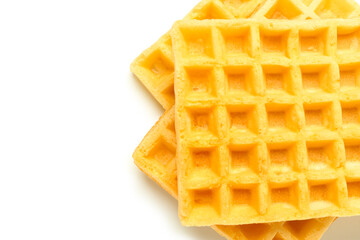 Tasty Belgian waffles on white background. Top view