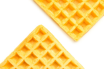 Tasty Belgian waffles on white background. Top view