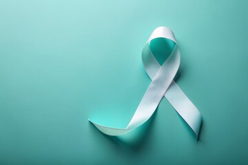 A delicate teal and white ribbon unfolding on a soft pastel blue background, symbolizing hope and solidarity for cervical cancer awareness and research efforts.