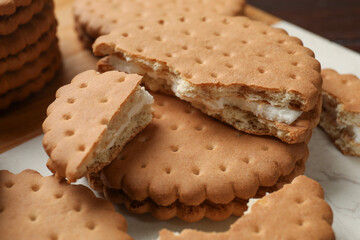 Fresh tasty sandwich cookies on table, closeup