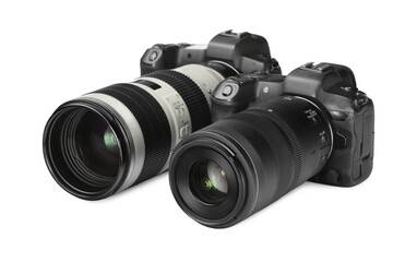 Modern cameras isolated on white. Photographer's equipment