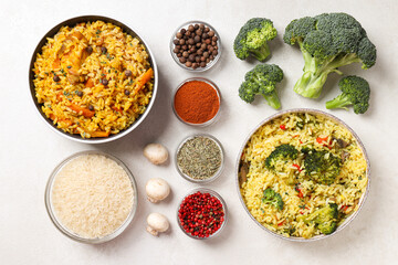 Pilaf in bowls, rice, spice and vegetables on white background, top view
