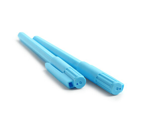 Blue ballpoint pens on white background