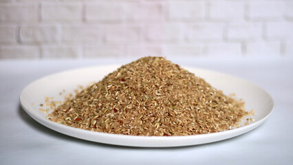 Germinated brown rice on white background.