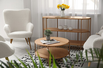 Interior of living room with sofa, armchairs and coffee table
