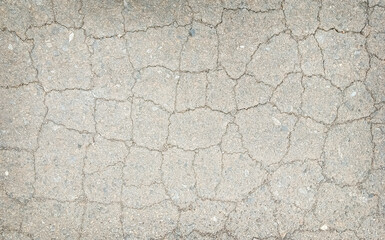 Broken road surface Cracked asphalt texture background