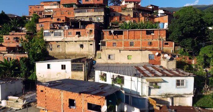 Suburban Houses In Hillside Slum (Favela) Near City Of Caracas, Venezuela. drone flyby shot