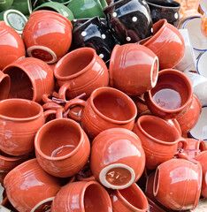 varieties of earthenware tea cups displayed in a fair shop for sale in India
