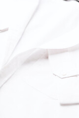 Close up of white Men's shirt.